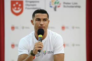 Le joueur de football portugais Cristiano Ronaldo participe à un événement caritatif à Singapour, le 6 juin 2023