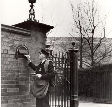 Aston villa Postman delivering mail at Aston Villa football ground, 1935